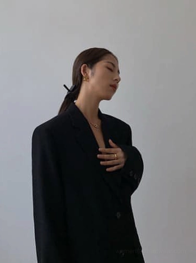 Black oversized blazer premium quality 100% polyester tailored construction detail shot