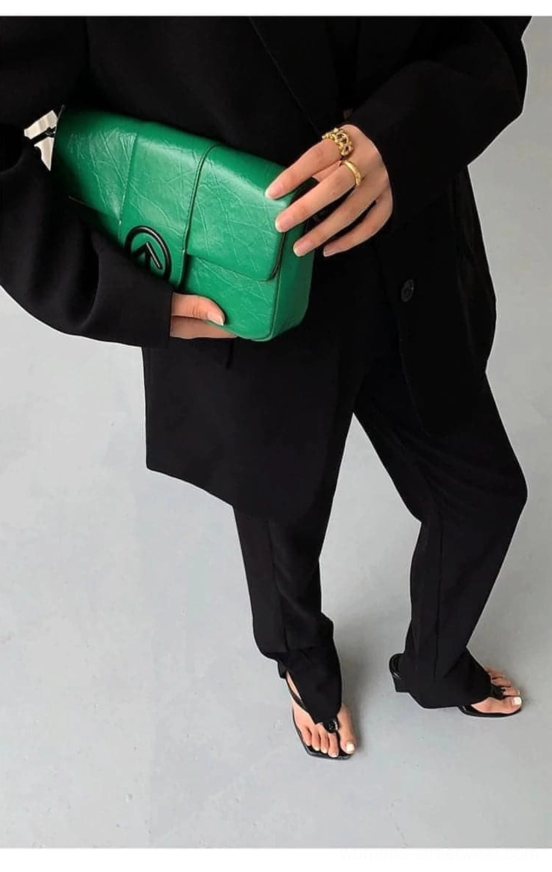 Black oversized blazer layering with slip dress evening smart casual styling suggestion