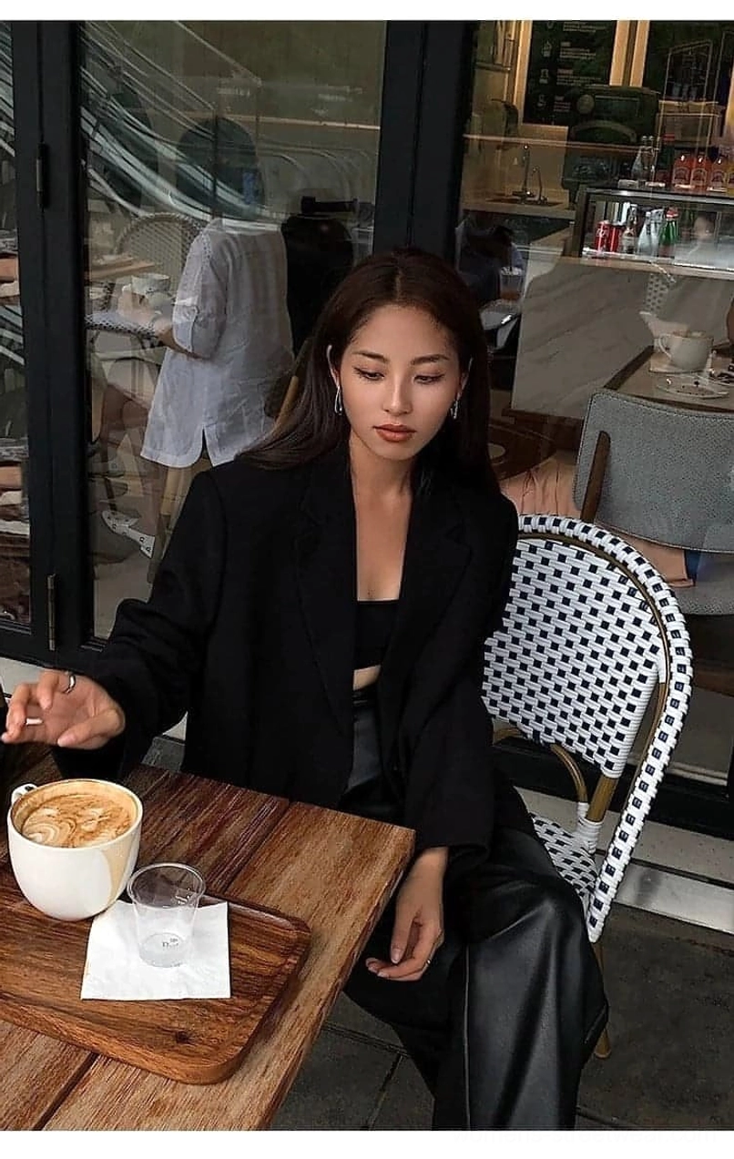 Black oversized blazer unstructured yet polished minimalist aesthetic Korean design principle