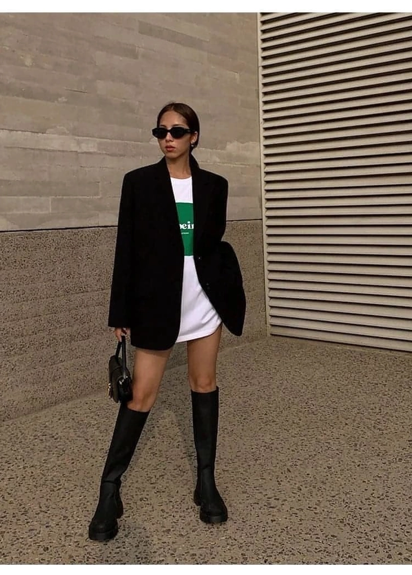 Black oversized blazer paired with white sneakers sneaker styling guide casual look