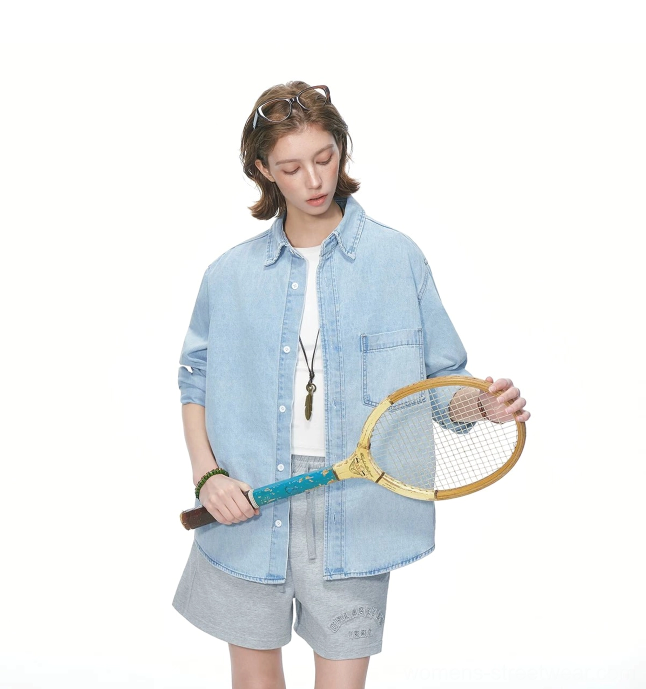Modern black oversized denim shirt with utility-inspired details for Y2K, Acubi, and contemporary streetwear outfits
