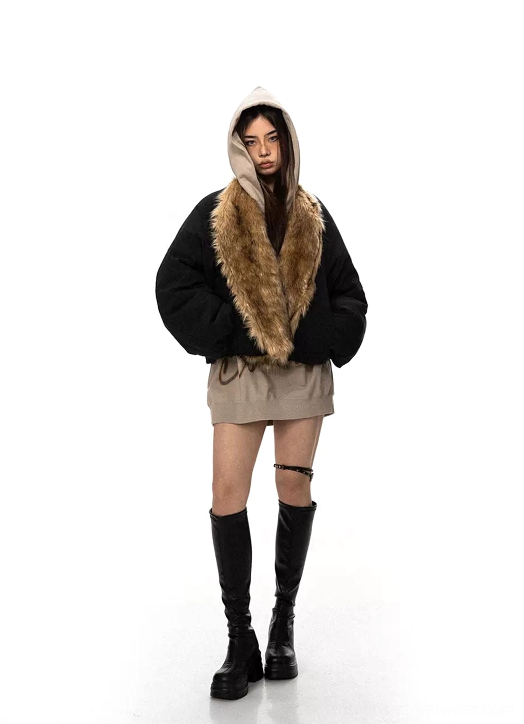 Black oversized faux fur collar bomber inspired flight jacket with beige hoodie and black boots front outfit view