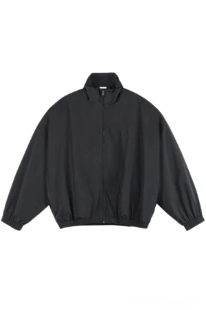Black oversized loose-fit windbreaker jacket with stand collar full front zipper elastic cuffs and hem