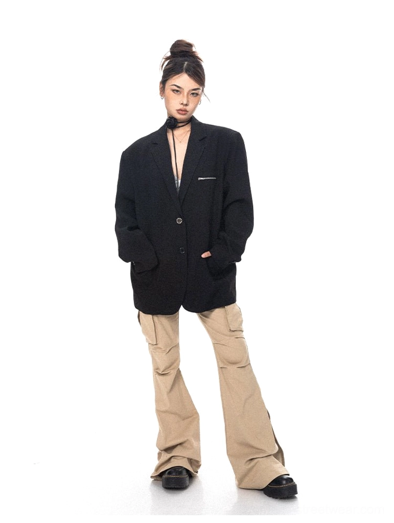 Full-body styling of a black oversized tailored streetwear blazer with cargo pants and black loafers