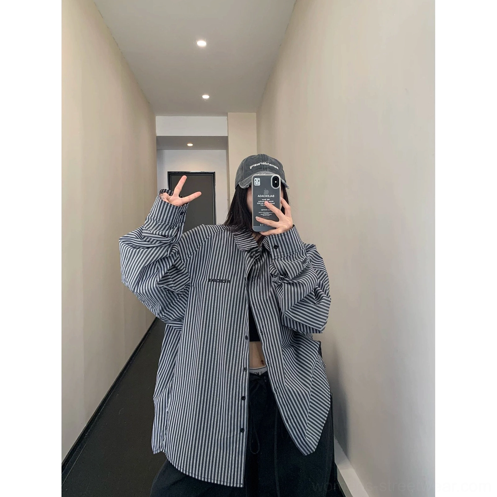 Black oversized vertical stripe cotton button-up shirt styled with black wide-leg pants for Korean streetwear outfit