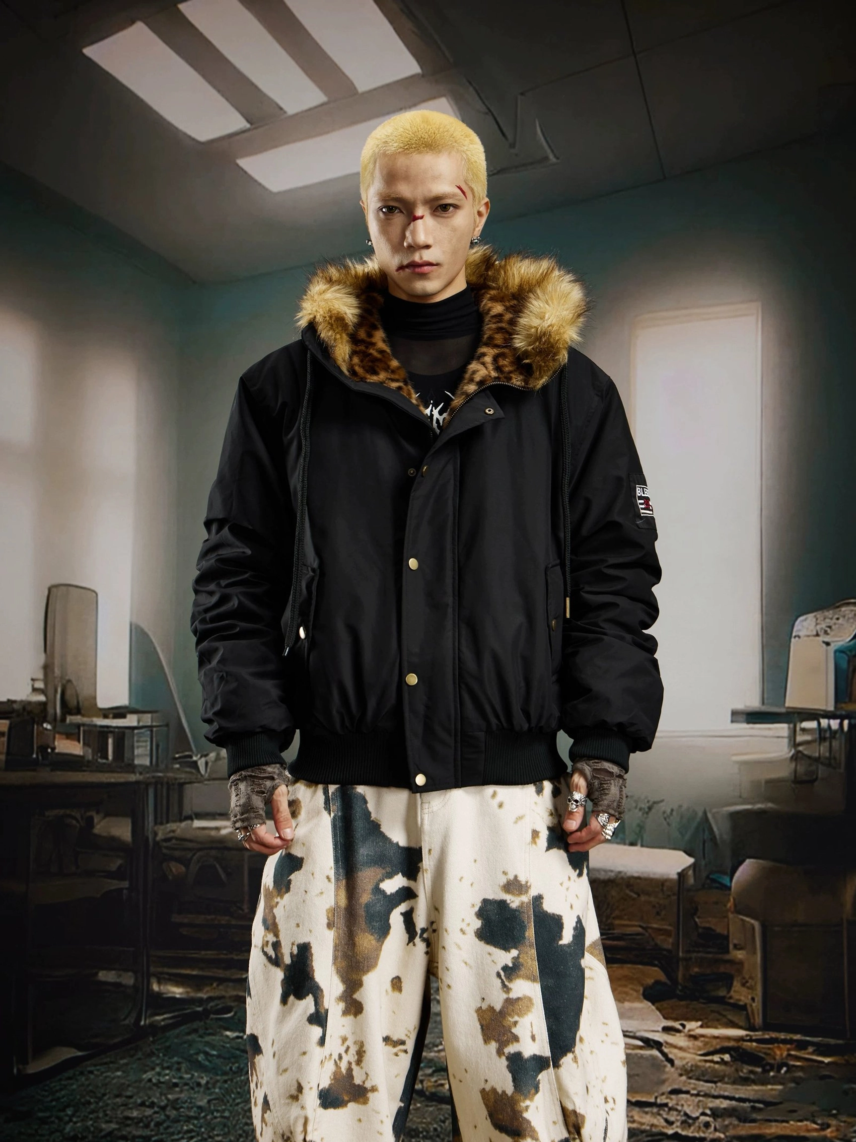 Black padded faux fur trim hooded bomber jacket product image featuring a relaxed oversized streetwear silhouette