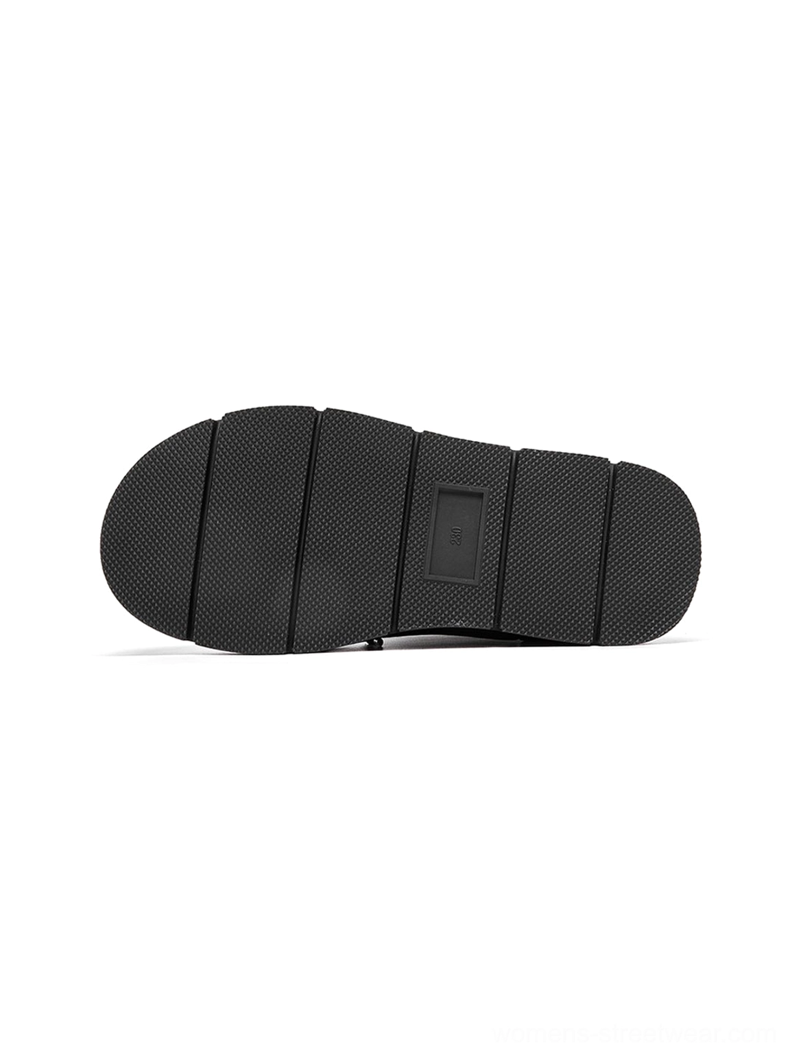 Black padded platform snow boots with matte synthetic padded upper and oversized laces fashion detail view