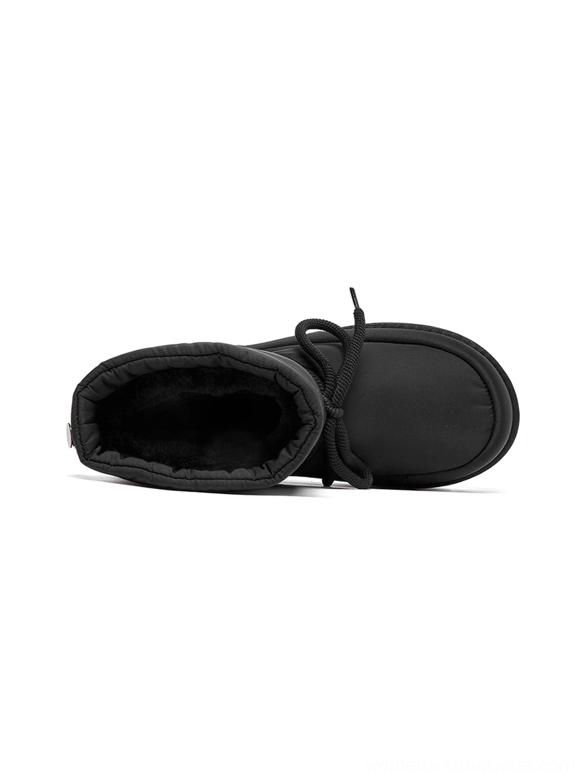 Black padded platform snow boots with soft plush interior and heel pull tab streetwear winter footwear view
