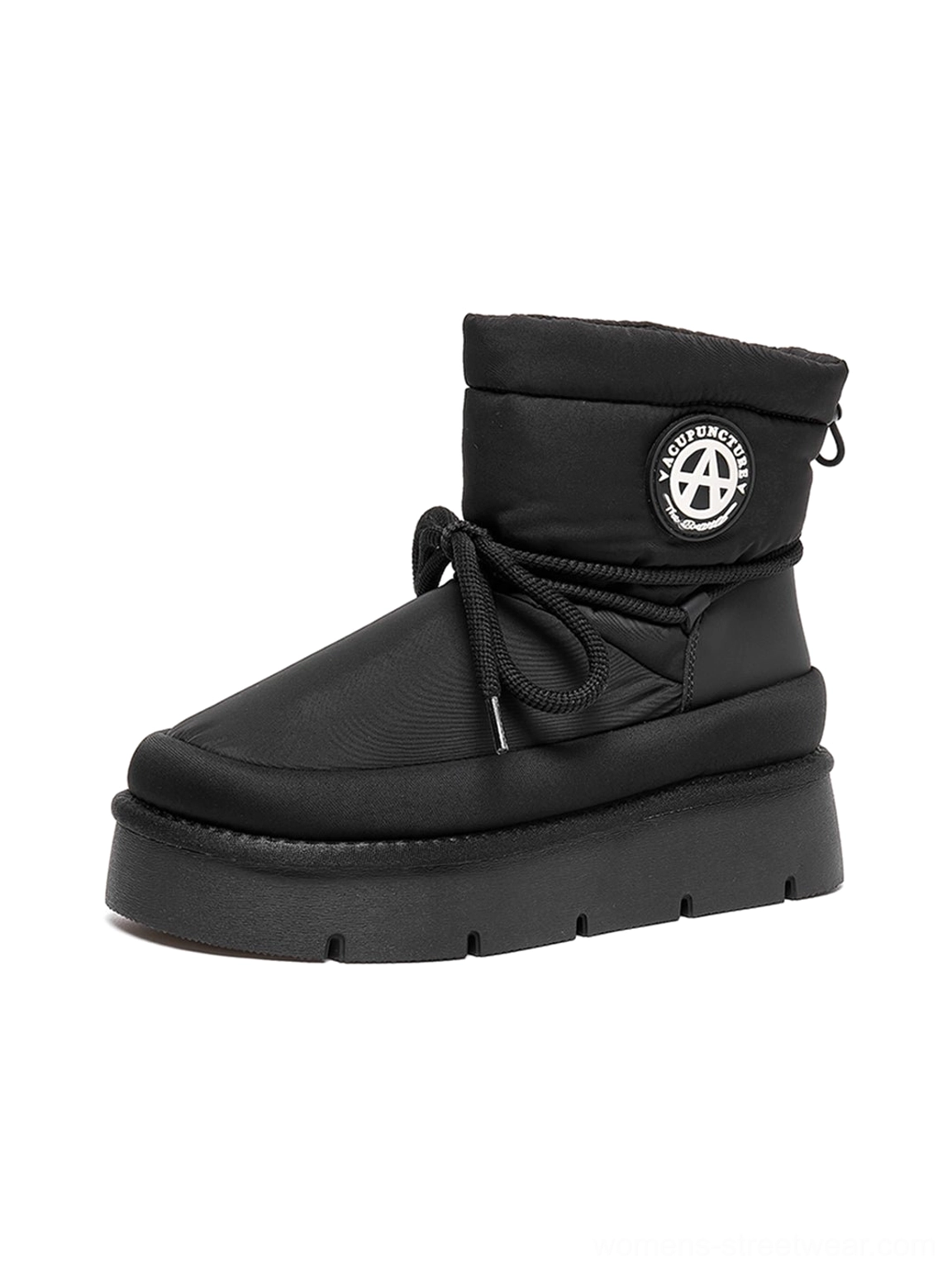 Black padded platform snow boots with thick flatform sole and padded ankle collar winter streetwear view