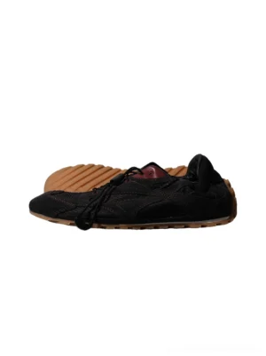 Black paneled nubuck low-profile trainers with gum rubber outsole and dark red lining