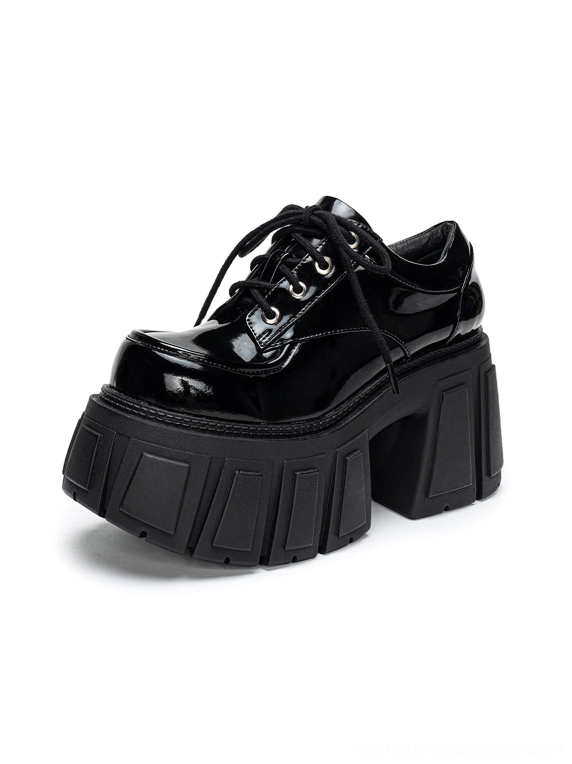 Black patent chunky derby platform shoes with bold elevated sole, lace-up front, and contemporary Y2K footwear design