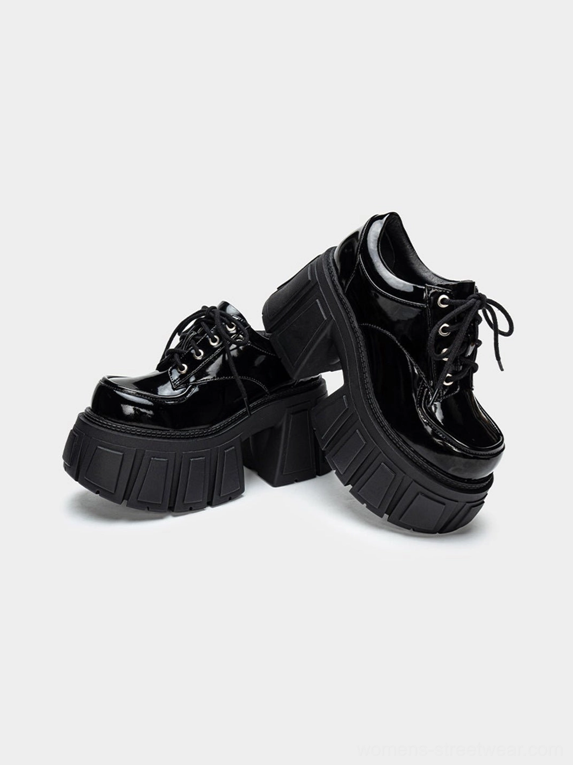 Black patent chunky platform derby heels product detail with glossy lace-up upper, rounded toe, and bold lug sole
