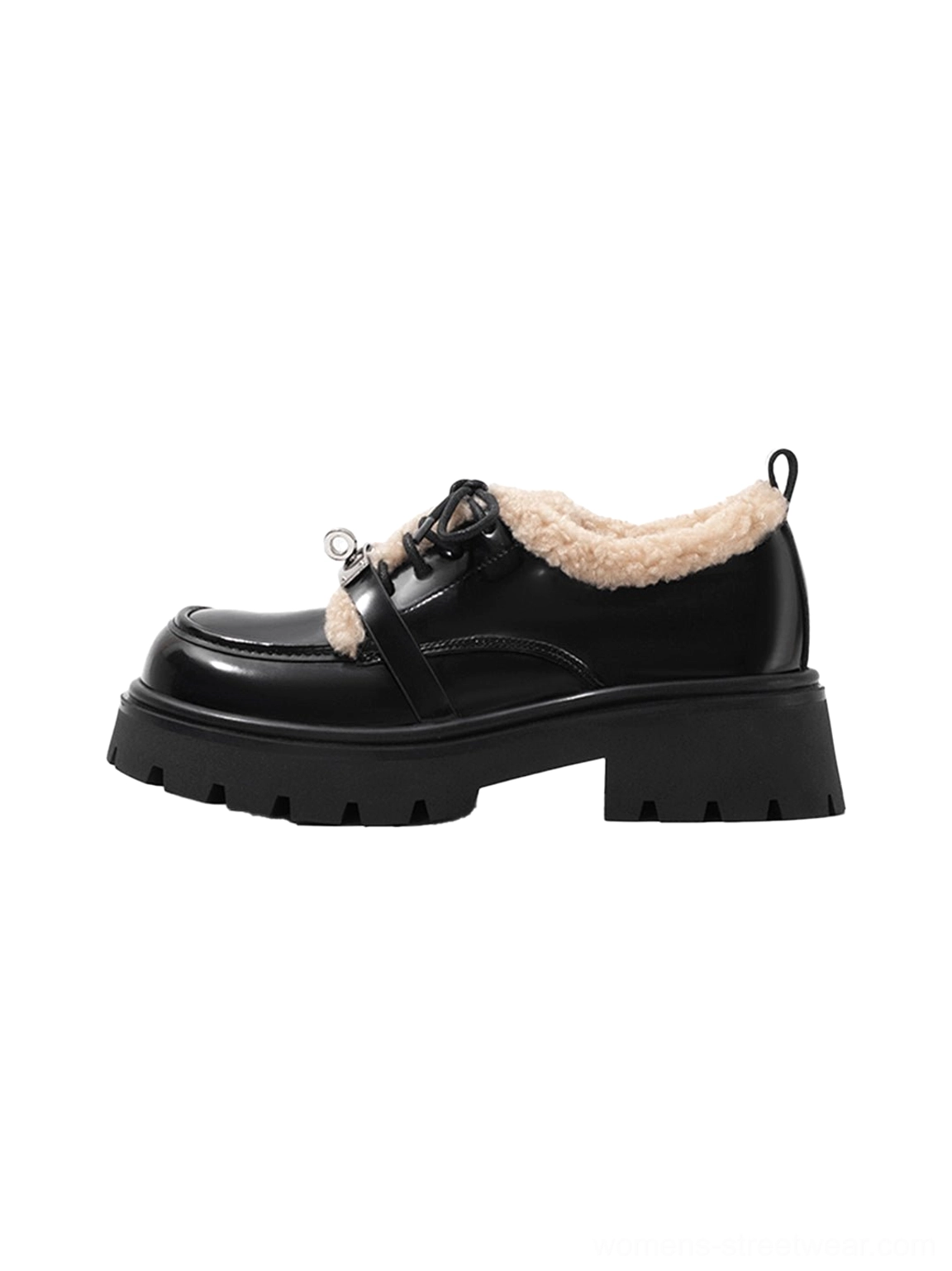 Side view of black patent fleece-collar platform Oxford shoes with beige shearling trim, metal lace buckle, and chunky lug sole