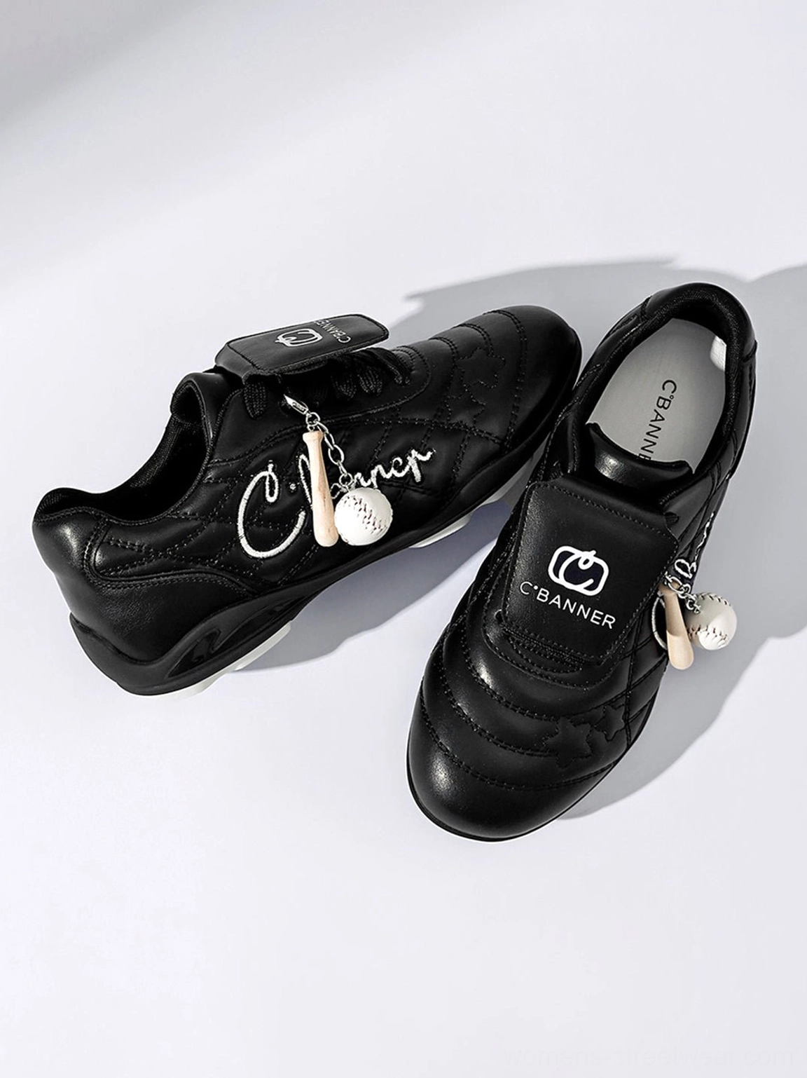 Black patent foldover tongue retro streetwear sneakers detailed product view