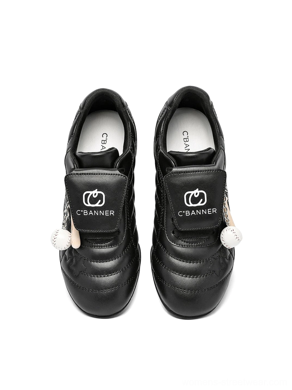 Black patent foldover tongue retro streetwear sneakers fashionable low-top sneaker view
