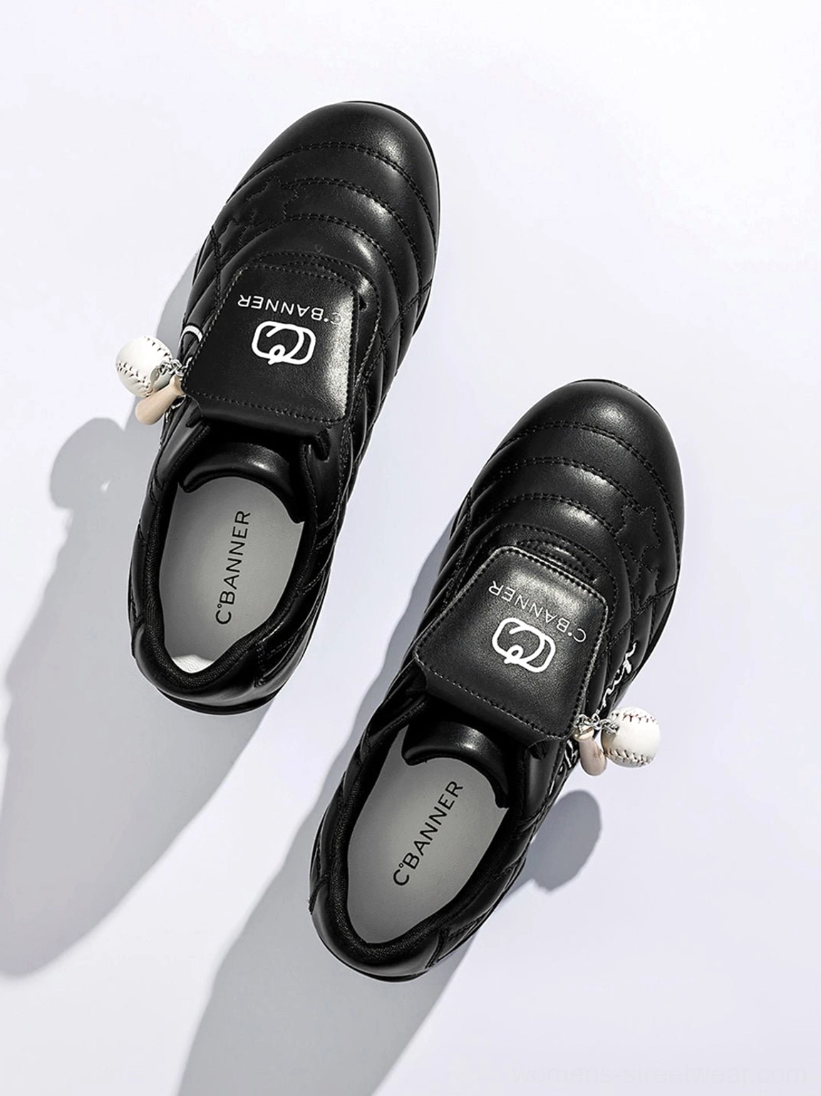 Black patent foldover tongue retro streetwear sneakers low-top silhouette product image