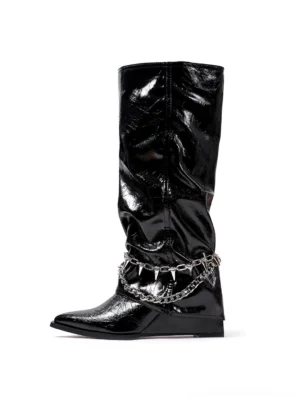 Black patent spiked chain mid-calf punk wedge boot front three-quarter product view on white background