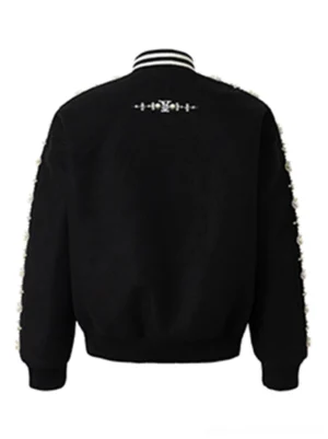 Back view of black pearl beaded varsity baseball jacket showing embroidered back detail ribbed collar and decorated sleeves