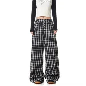Black plaid high-waisted wide-leg streetwear pants shown from the front with button placket and relaxed oversized fit