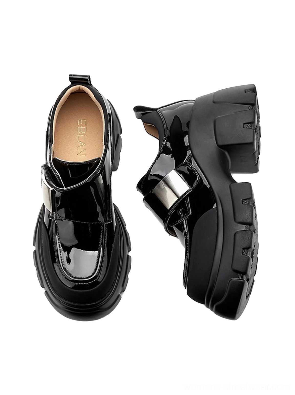 Black platform Mary Jane shoes showing the glossy top vamp, branded insole, and textured traction outsole