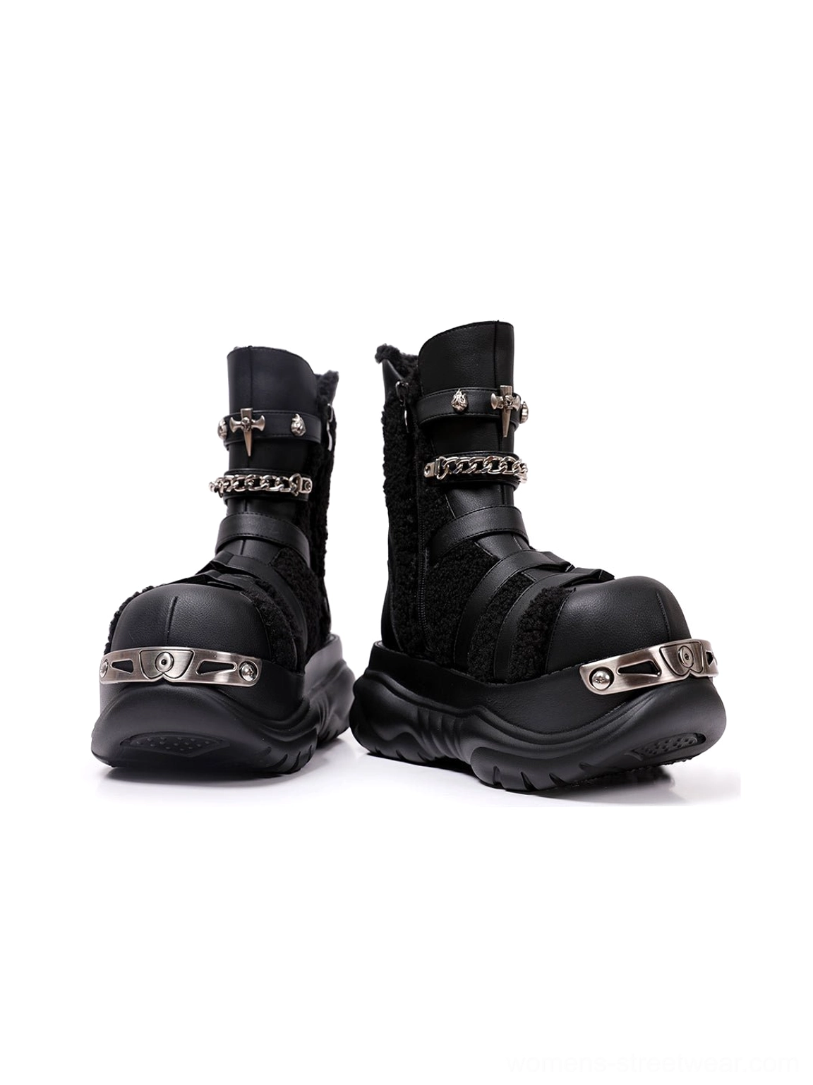 Right-side view of black platform moto boots displaying layered buckle straps, chain-style hardware, matte finish, and chunky lug outsole