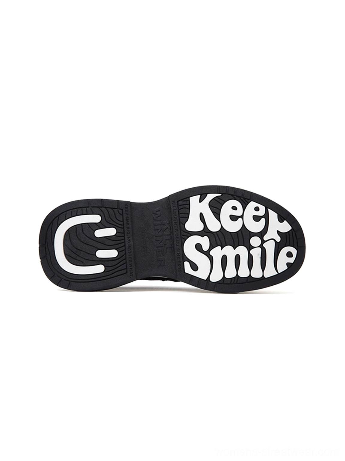 Black platform sneaker outsole with textured non-slip tread, Keep Smile text, and smiling face graphic