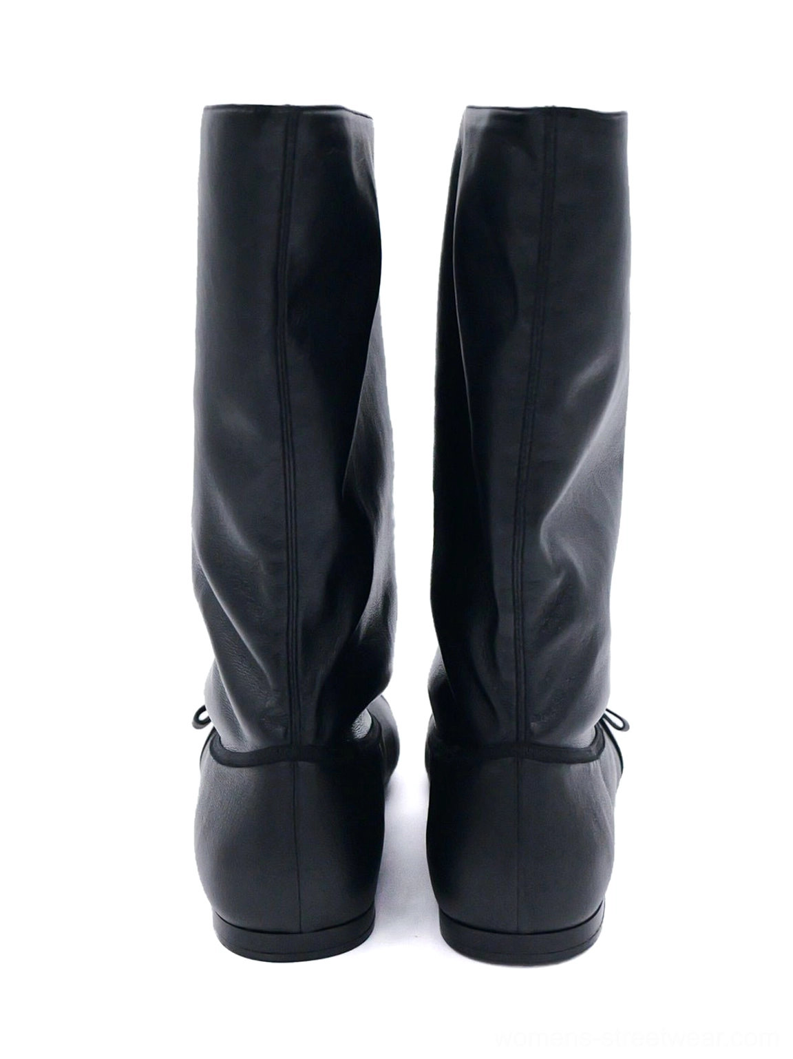 Black pleated foldover mid-calf boots with rounded toe and bow detail styled for modern Korean streetwear fashion