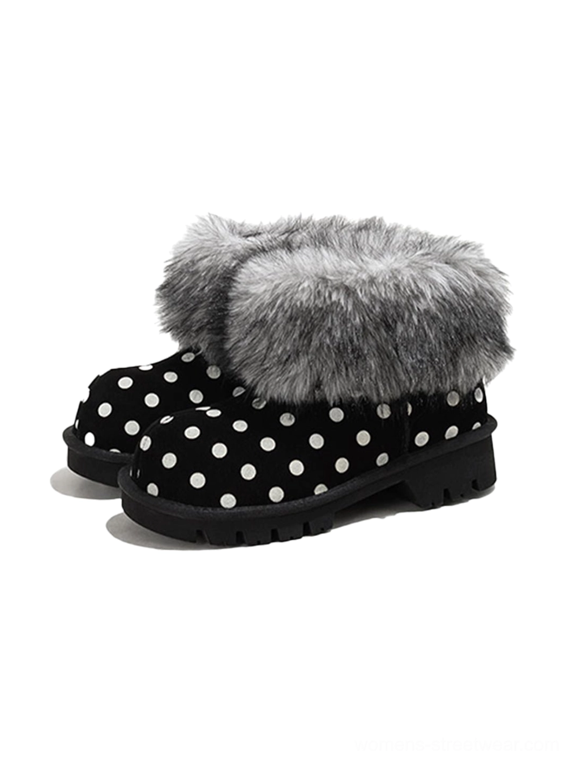Pair of black polka dot faux fur cuff chunky platform snow boots side view