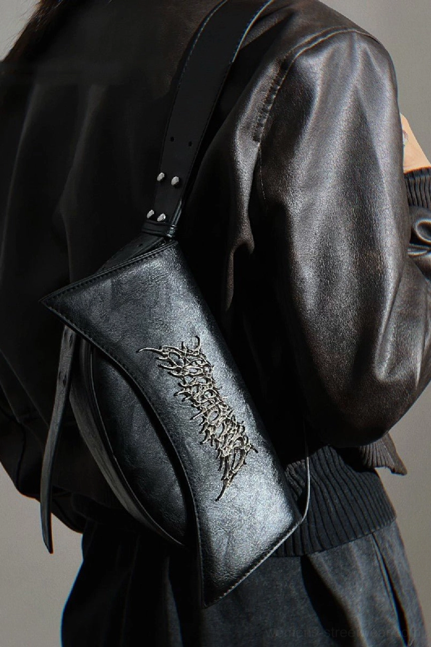 Black PU leather shoulder bag back wearing view showing adjustable strap and silver metal buckle hardware