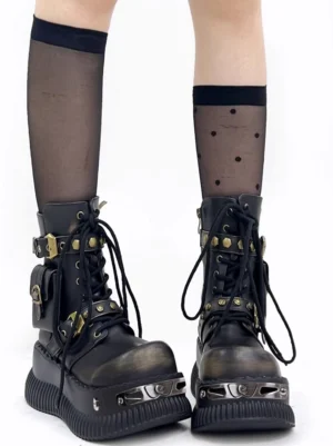 Black punk platform ankle boots worn with sheer polka dot stockings, buckle straps, ankle pocket details, and alternative streetwear styling