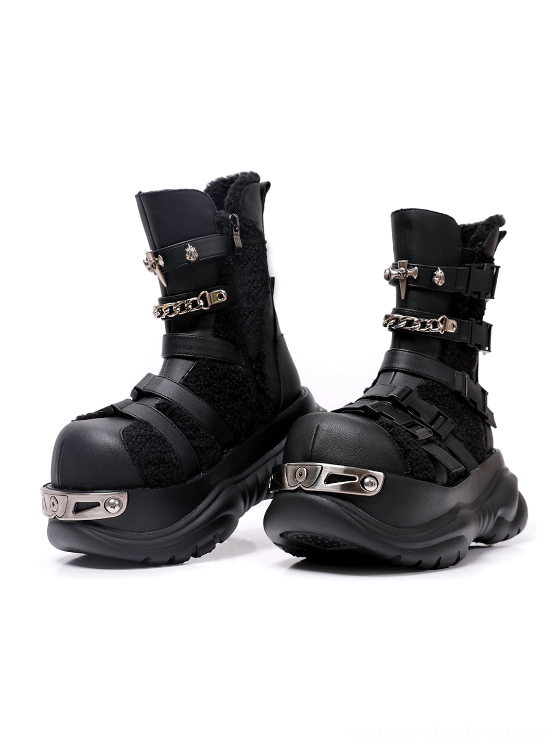 Front view of black punk platform moto boots featuring silver-tone buckles, chain straps, fleece panels, and metal toe cap details