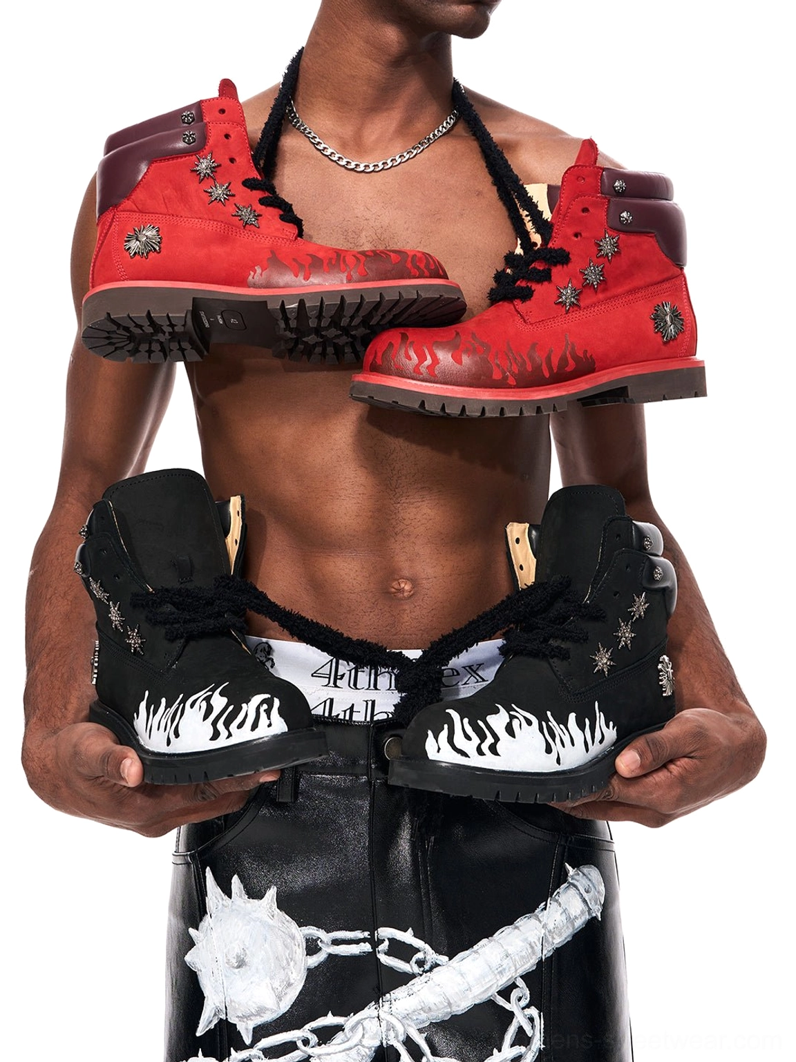 Two pairs of black and red flame appliqué genuine leather lug sole combat boots with contrast graphics and rugged outsoles