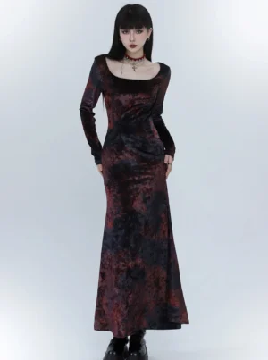 Front view of a black and red marbled velvet fishtail maxi dress with square neckline, fitted long sleeves, sculpted bodice, and floor-length gothic silhouette