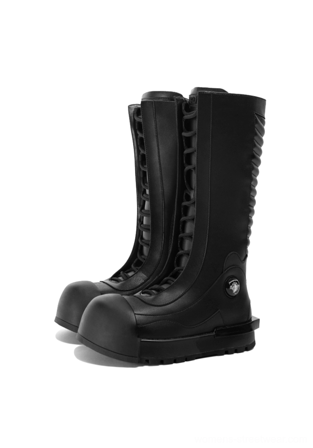 Black ribbed knee-high platform combat boots shown from the front three-quarter angle with lace-up closure, chunky treaded sole, and all-black techwear streetwear design