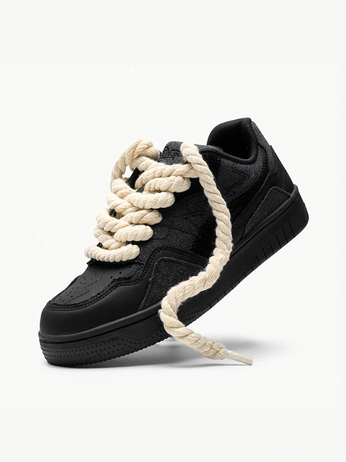 Black rope lace low-top streetwear sneakers product detail view
