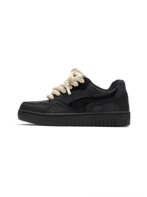 Black rope lace low-top streetwear sneakers side profile on a clean white background