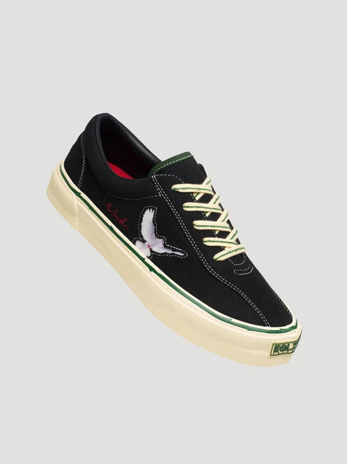 Black rose embroidered low-top skate shoes with textured upper and contrast details for casual everyday streetwear