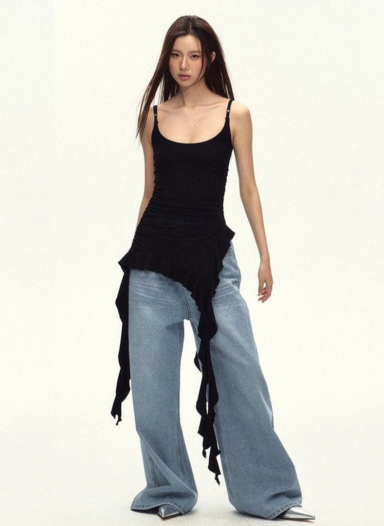 Black ruched cami top with asymmetric draped hem and adjustable spaghetti straps for Y2K and Korean street style