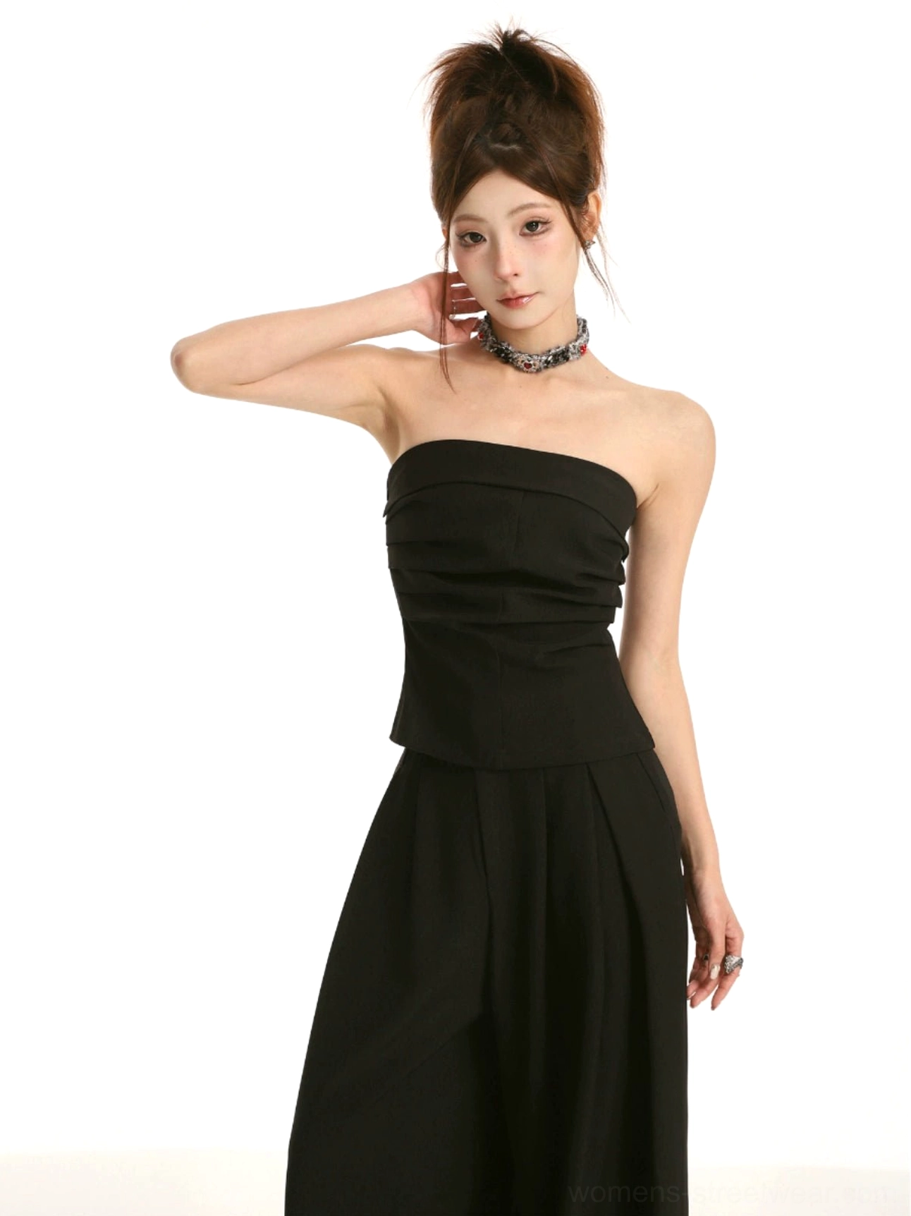 Black ruched strapless tube top and high-waist wide-leg streetwear trousers front view on model