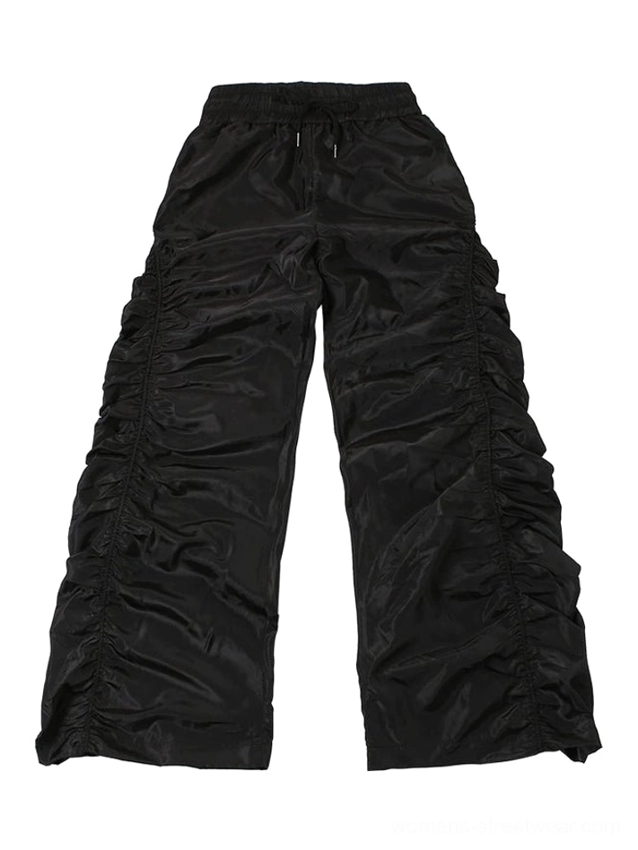 Black ruched wide-leg streetwear cargo pants displayed flat with adjustable drawstring waistband and gathered side details