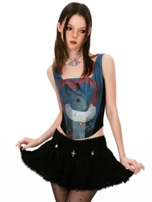 Black ruffled tiered lace mini skirt styled with a matching corset top and sheer dotted tights