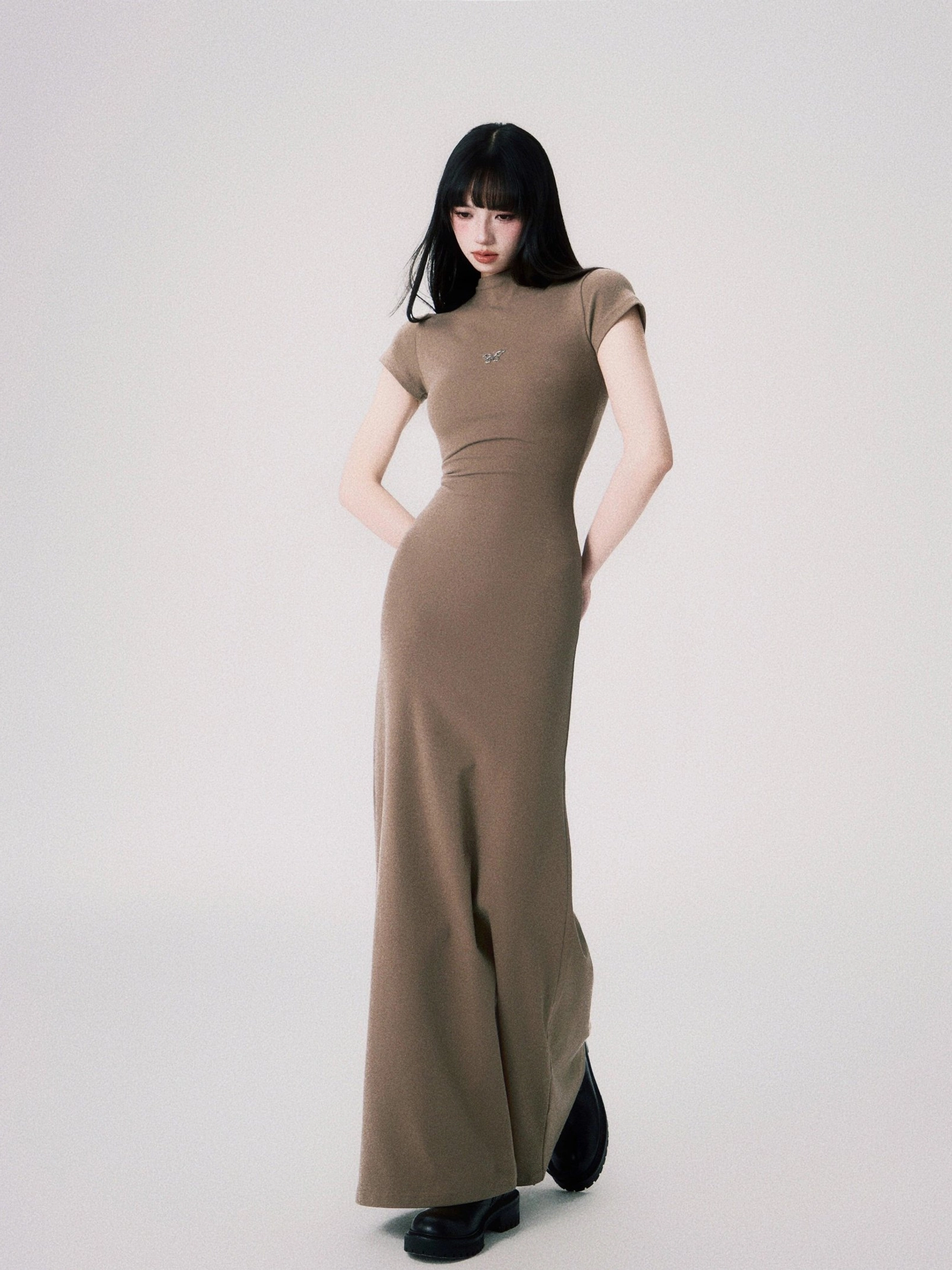 Elegant black or sand butterfly emblem maxi dress for evening occasions modern styling and city wear