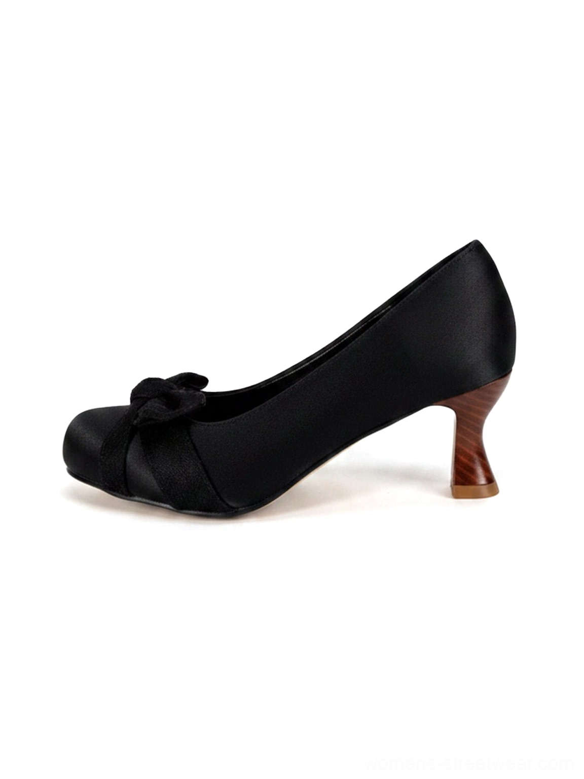 Black satin-look bow pumps with rounded closed toe and sculpted wood-look cup heel shown in a left side product view