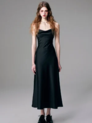 Black satin cowl neck open back slip maxi dress with slim straps shown in full front view