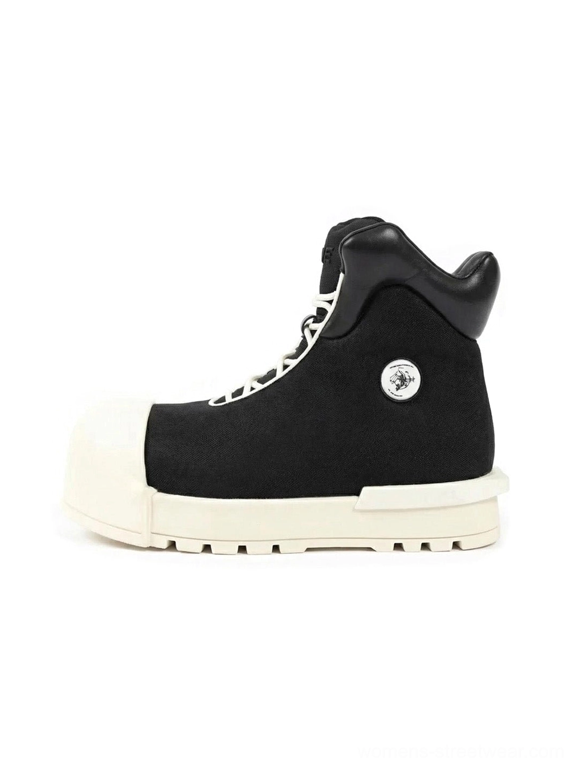Black sculpted-toe platform high-top boots shown from the left side with oversized off-white toe cap, thick sole, high padded collar, lace-up front, and round metal side detail