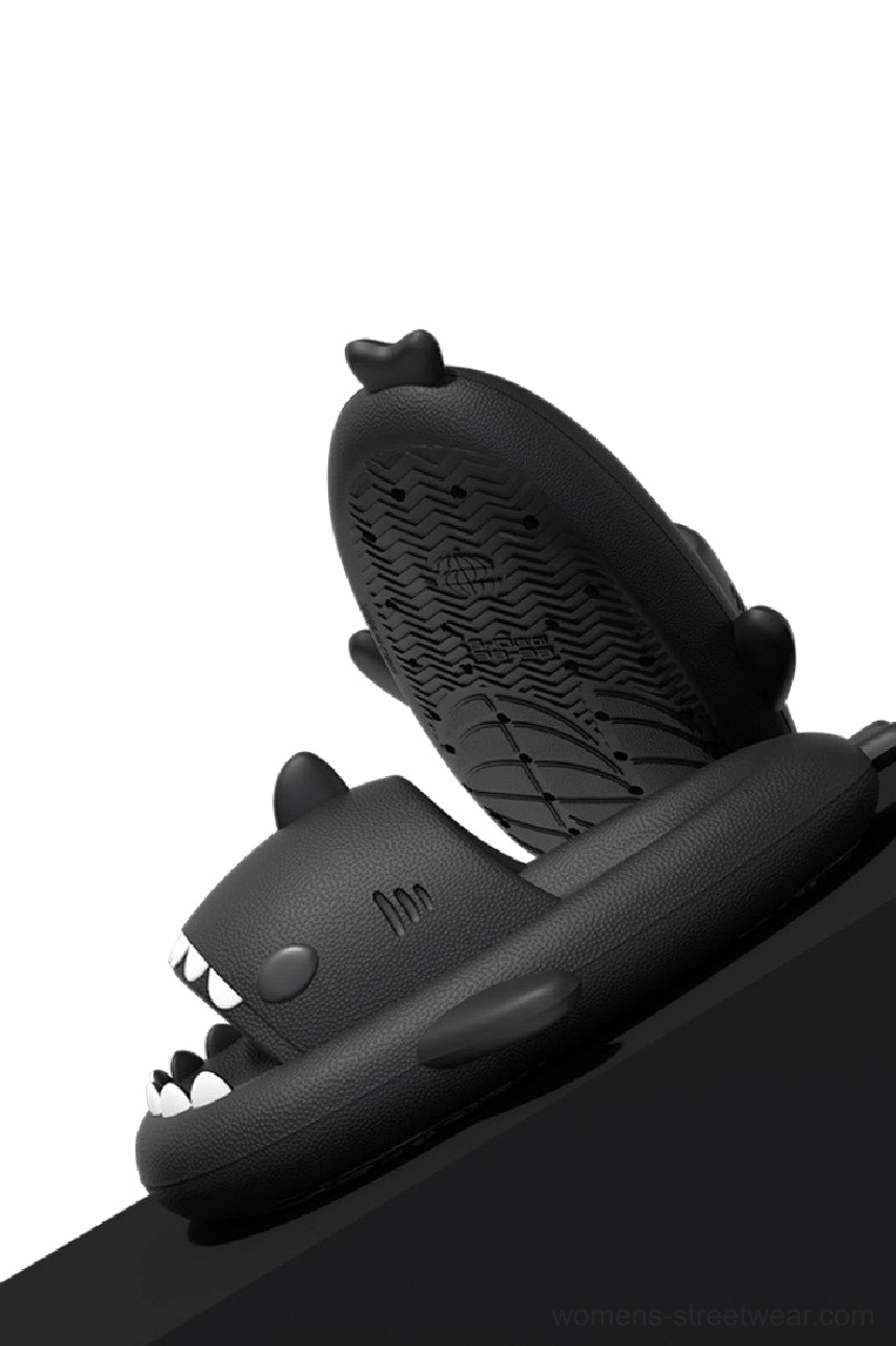 Black shark slide slippers with textured anti-slip footbed, cartoon shark styling, and thick comfortable EVA sole