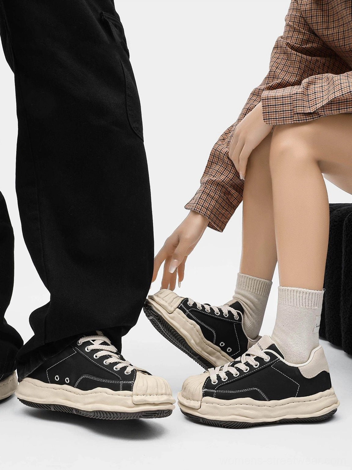 Two pairs of black shell-toe platform sneakers styled with different casual trousers to show versatile unisex streetwear outfit matching