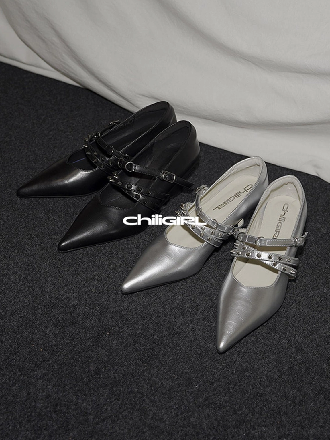 Black and silver pointed toe double strap wedge pumps displayed together in contrasting streetwear colorways