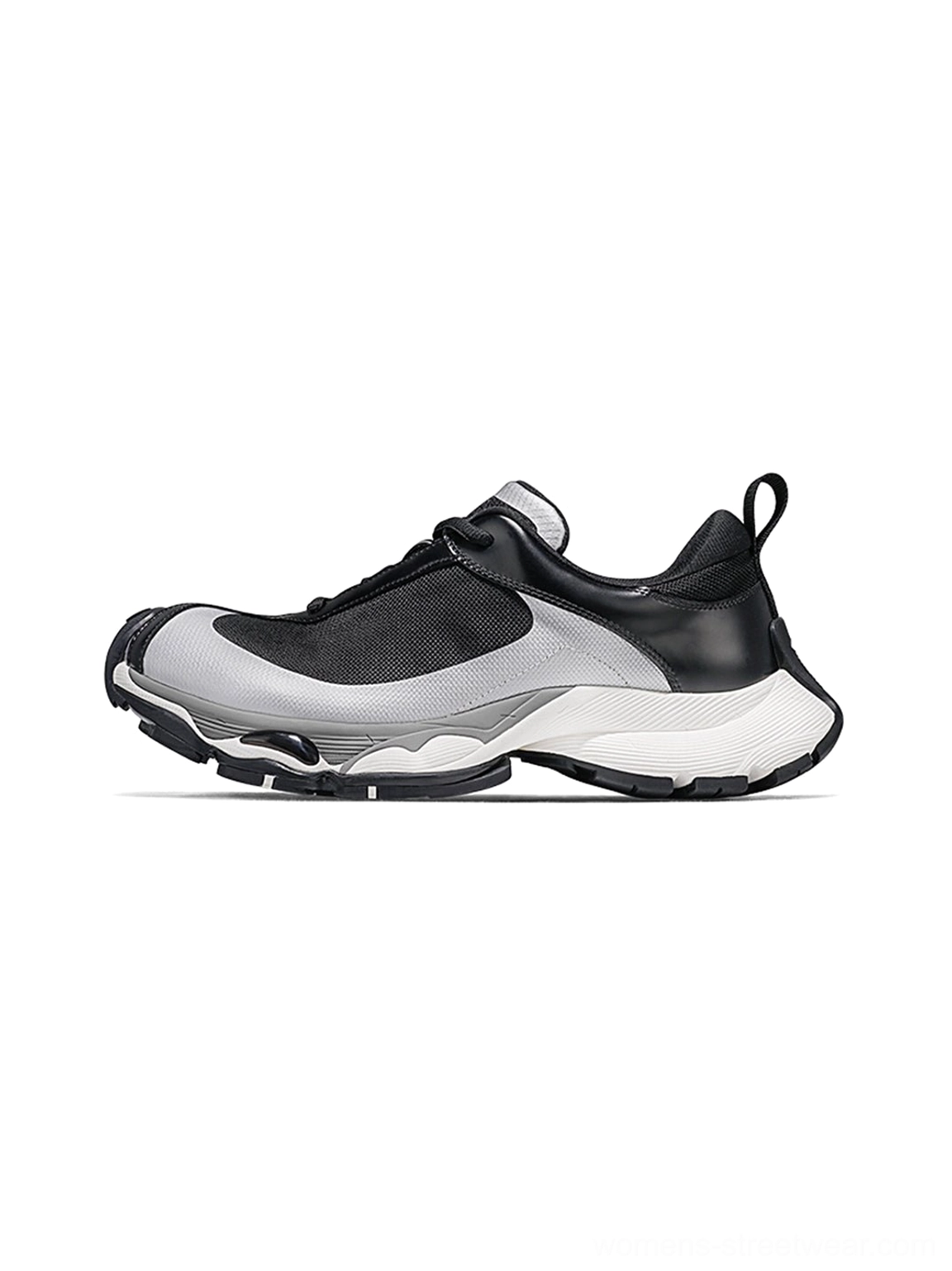 Black and silver split-toe technical runner sneakers with a chunky sculpted outsole and futuristic unisex streetwear design
