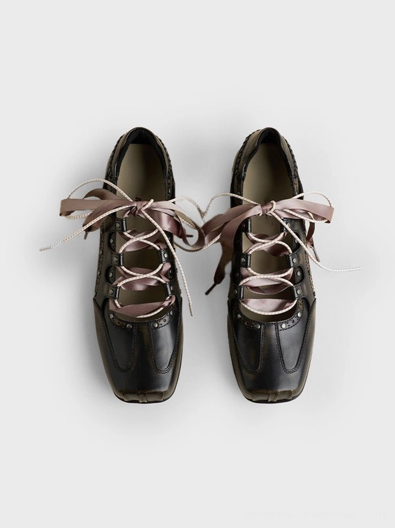 Pair of black square front ballet trainer sneakers with symmetrical pink-brown satin ribbon bows